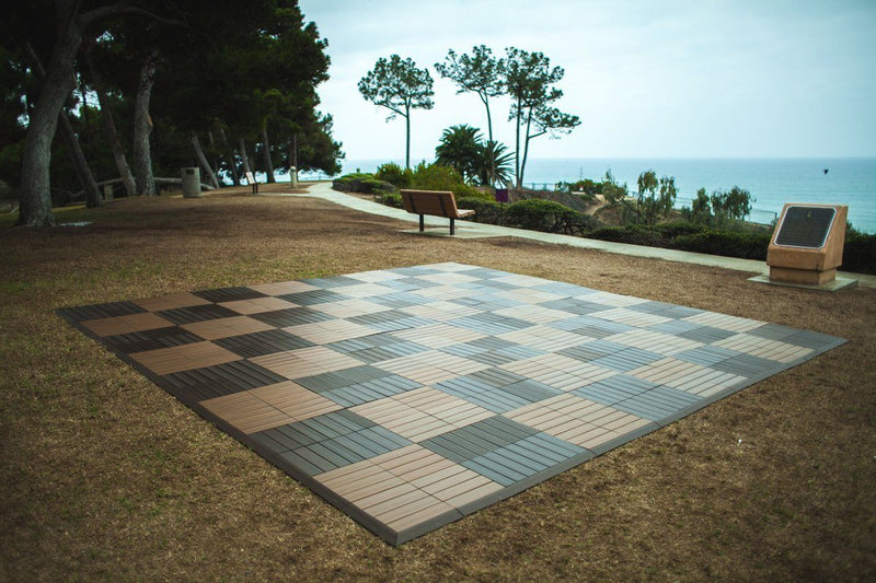 MegaChess Commercial Grade Synthetic Wood Giant Chess Board With 24 Inch Squares 16' x 16' Available ADA Compliant Safety Edge Ramps |  | GiantChessUSA